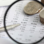 View at financial details in table thru magnifying glass