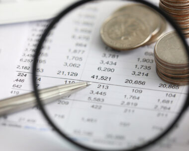 View at financial details in table thru magnifying glass