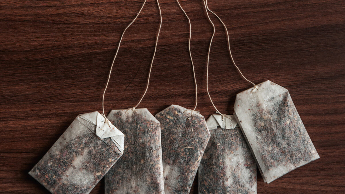 Tea-bags on walnut background