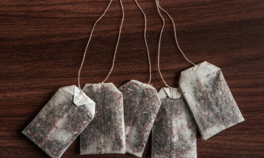 Tea-bags on walnut background