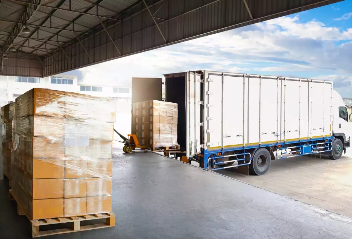 Container Trucks Parked Loading Package Boxes Pallets at Warehouse Dock. Supply Chain, Distribution Warehouse Shipping, Supplies Shipment Boxes. Freight Truck Logistic, Cargo Transport