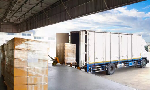 Container Trucks Parked Loading Package Boxes Pallets at Warehouse Dock. Supply Chain, Distribution Warehouse Shipping, Supplies Shipment Boxes. Freight Truck Logistic, Cargo Transport