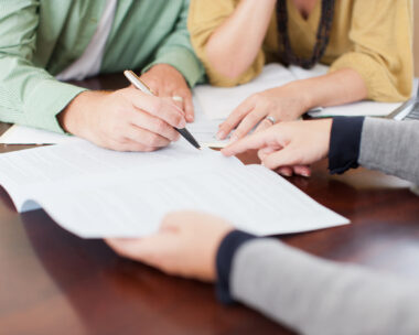 Couple signing contract