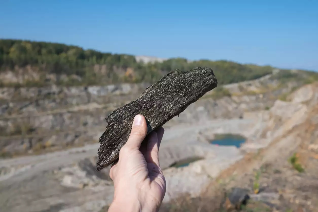Mining Site Featuring Graphite Deposit, Mineral Production, and Natural Stone Surroundings