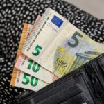 a wallet with euro money