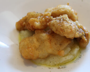 Greek cuisine: bakaliaros (fried cod) with mashed potatoes