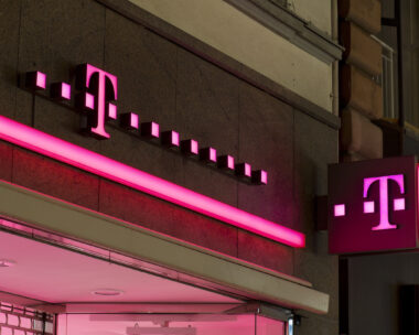 Red Illuminated sign of Telekom Shop
