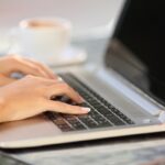 a woman working on a laptop