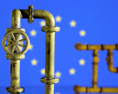 Model of natural gas pipeline and EU flag