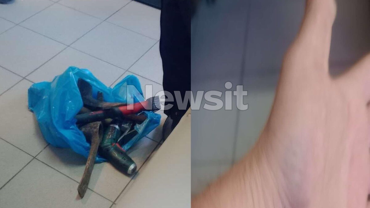 Μία σακούλα με εργαλεία και ένα χέρι