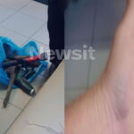Μία σακούλα με εργαλεία και ένα χέρι