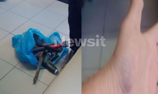 Μία σακούλα με εργαλεία και ένα χέρι