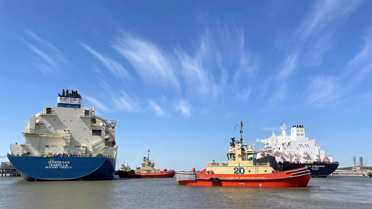 An LNG tanker is guided by tug boats at the Cheniere Sabine Pass LNG export unit in Cameron Parish, Louisiana, U.S., April 14, 2022.