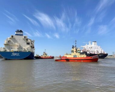 An LNG tanker is guided by tug boats at the Cheniere Sabine Pass LNG export unit in Cameron Parish, Louisiana, U.S., April 14, 2022.