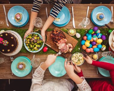 Overhead view on decorated Easter table with family around