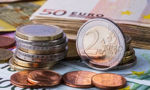 Banknotes and euro coins of different denominations