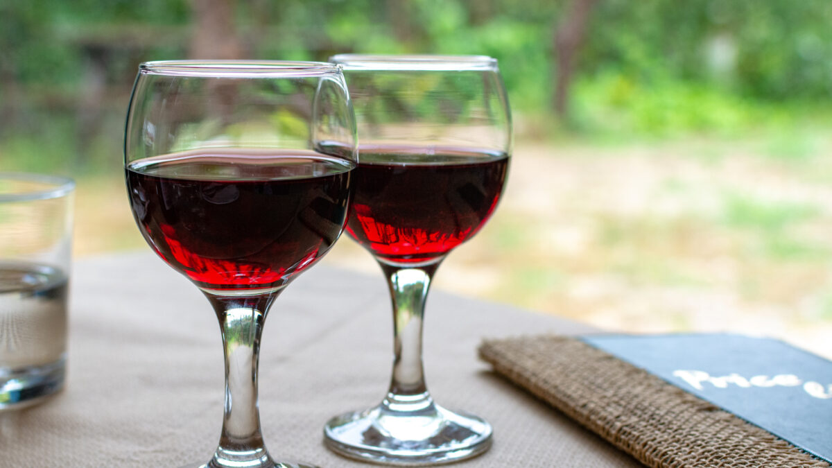Red greek wine is glass from Nemea region, wine tasting, close up