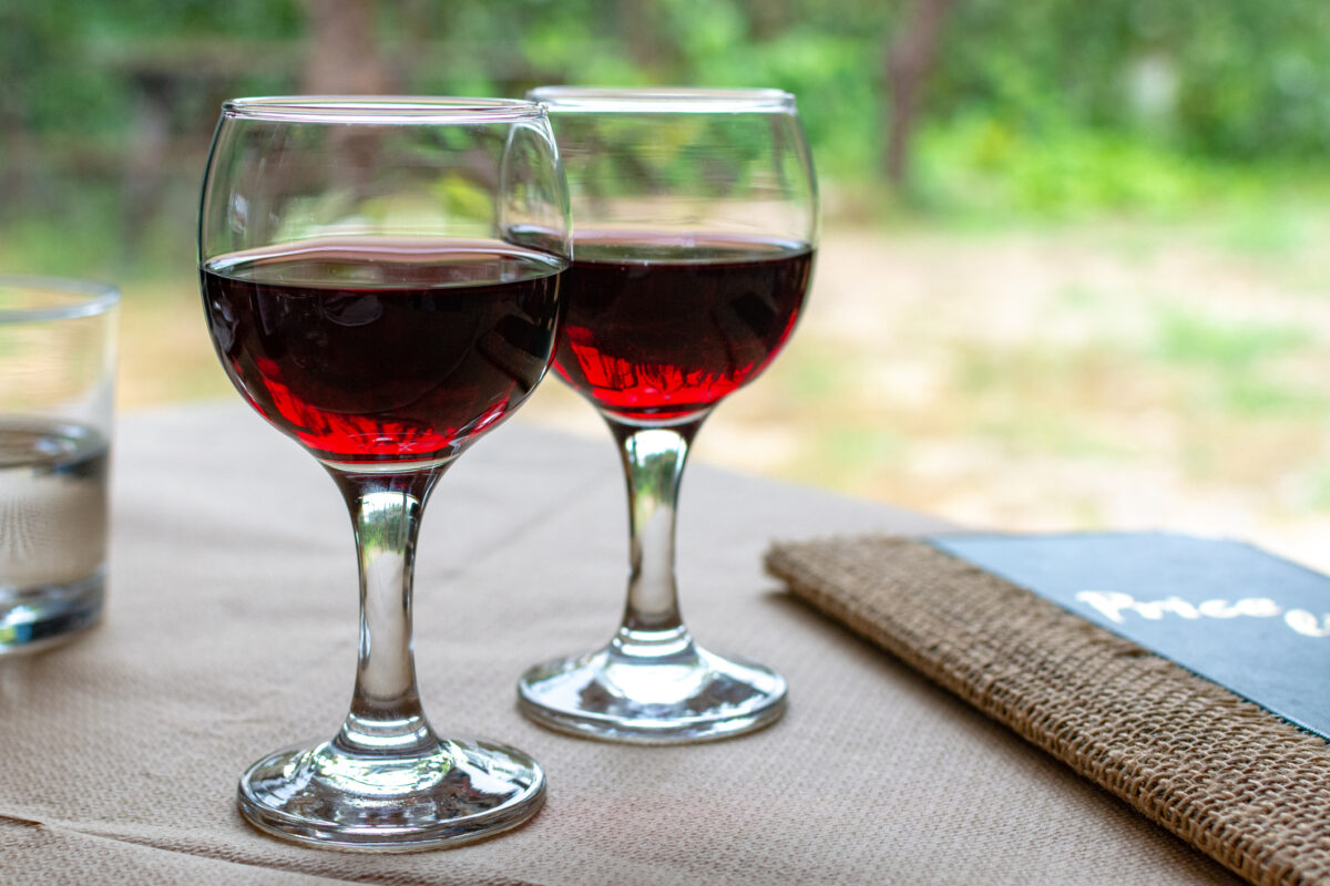 Red greek wine is glass from Nemea region, wine tasting, close up