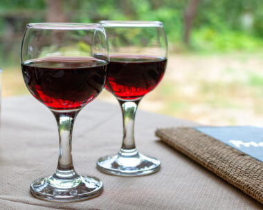 Red greek wine is glass from Nemea region, wine tasting, close up