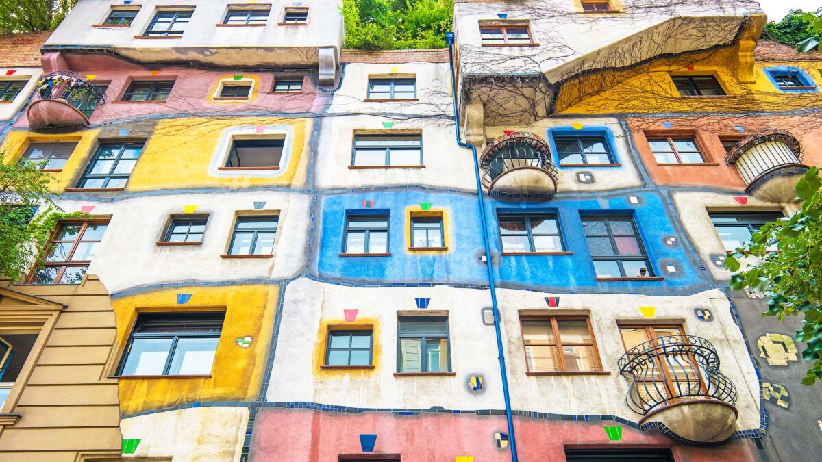 Hundertwasserhaus is an apartment house in Vienna, Austria, designed by Austrian artist Friedensreich Hundertwasser with architect Joseph Krawina as a co-creator.