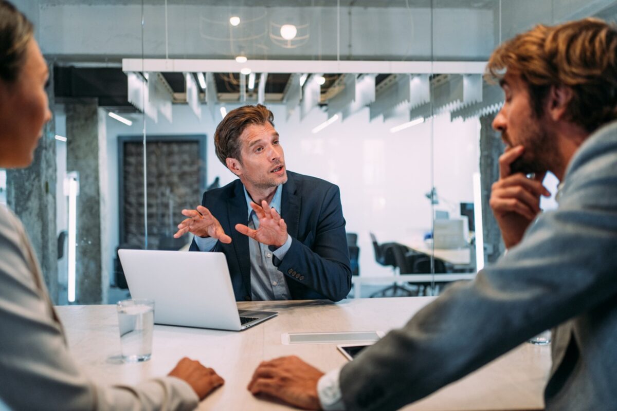 Group of business persons in business meeting
