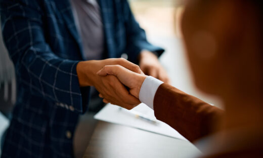 Close up of business people shaking hands