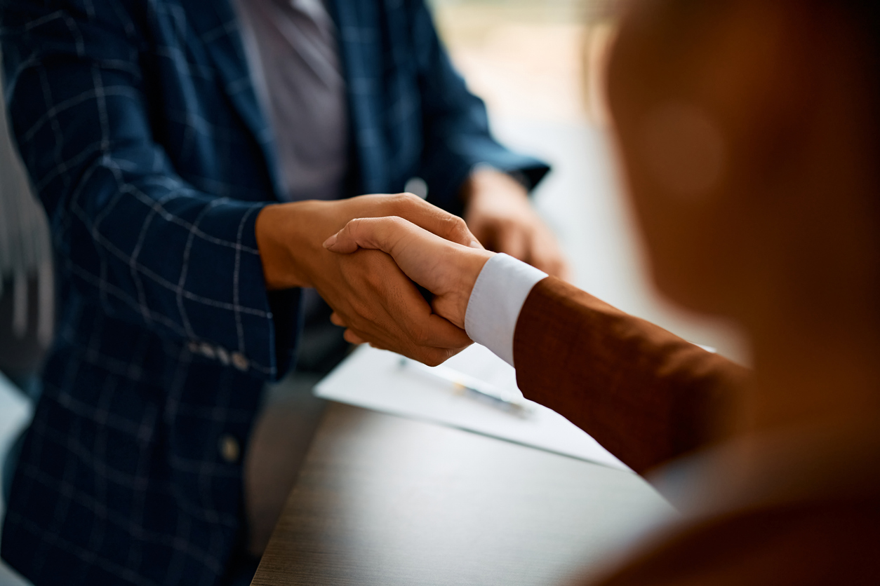 Close up of business people shaking hands