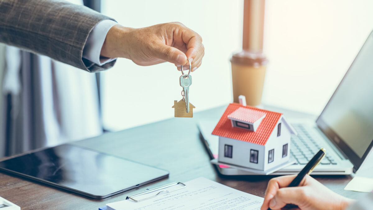 Real estate agent or real estate agent was holding the key to the new landlord
