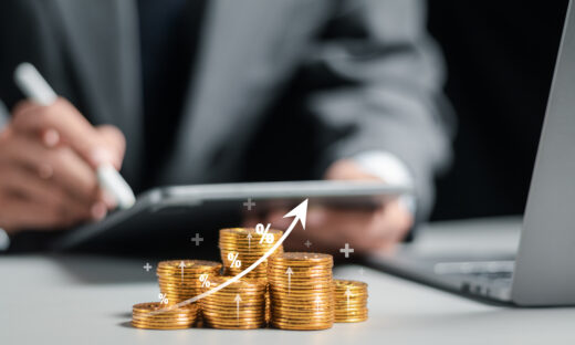 Businessman collecting coins with profit chart analysis business growth, profit growth management and corporate financial statistics