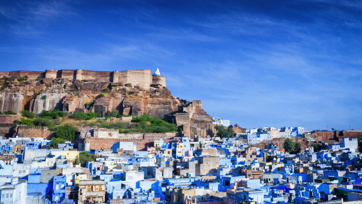 High angle cityscape of the Blue City and Mehrangarh Fort, Jodhpur, India.