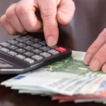 Someone counting money
