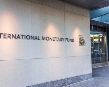 IMF entrance with sign of International Monetary Fund and logo