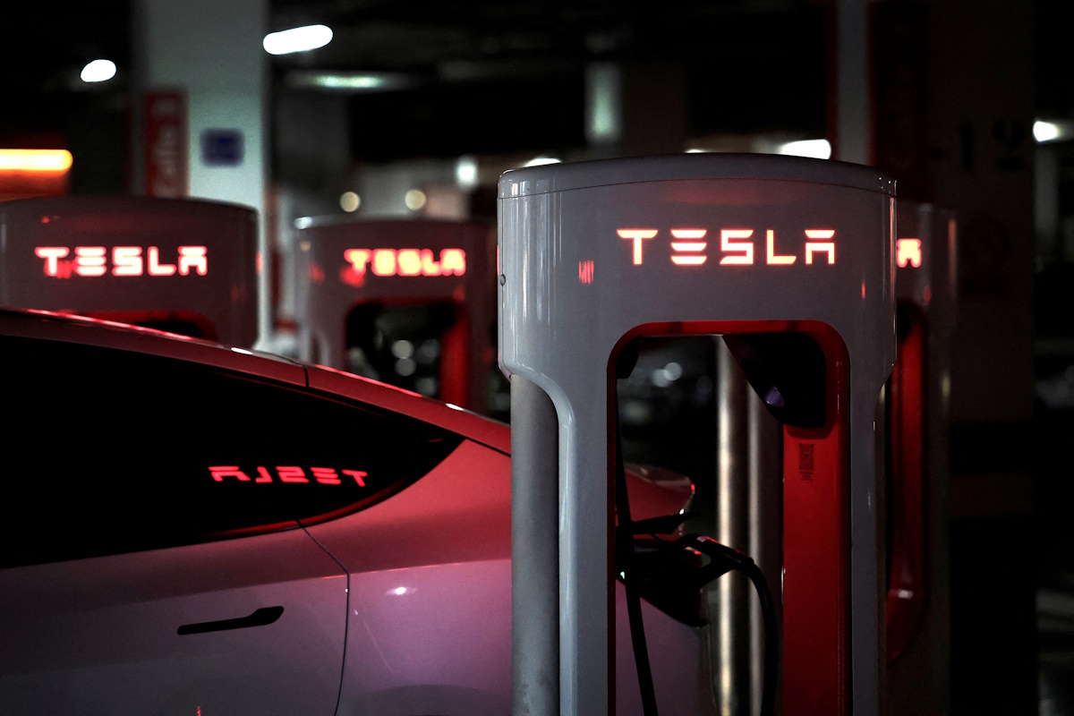 A Tesla electric vehicle is charged