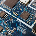 Semiconductor chips are seen on a circuit board of a computer