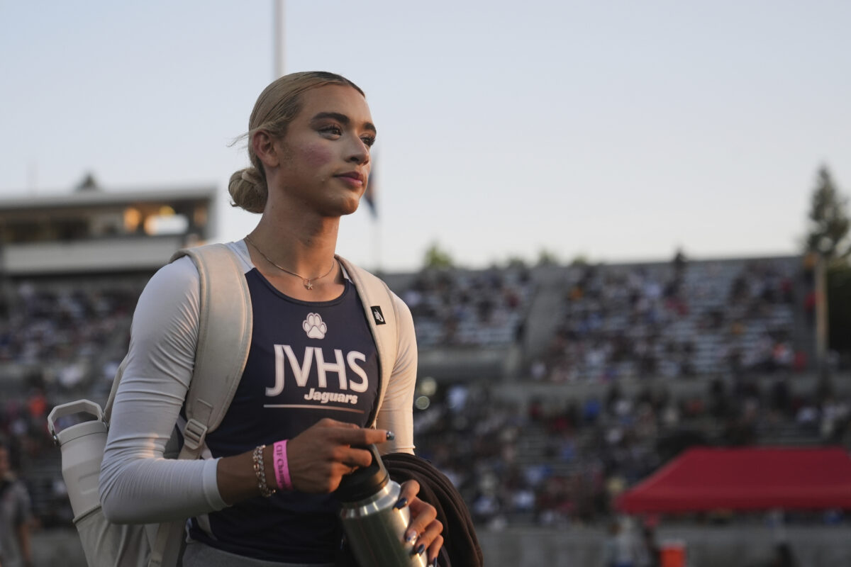 AB Hernandez, a transgender student at Jurupa Valley High School, leaves the stadium after competing in the triple jump at the California high school track-and-field championships in Clovis, Calif., Friday, May 30, 2025. (AP Photo
