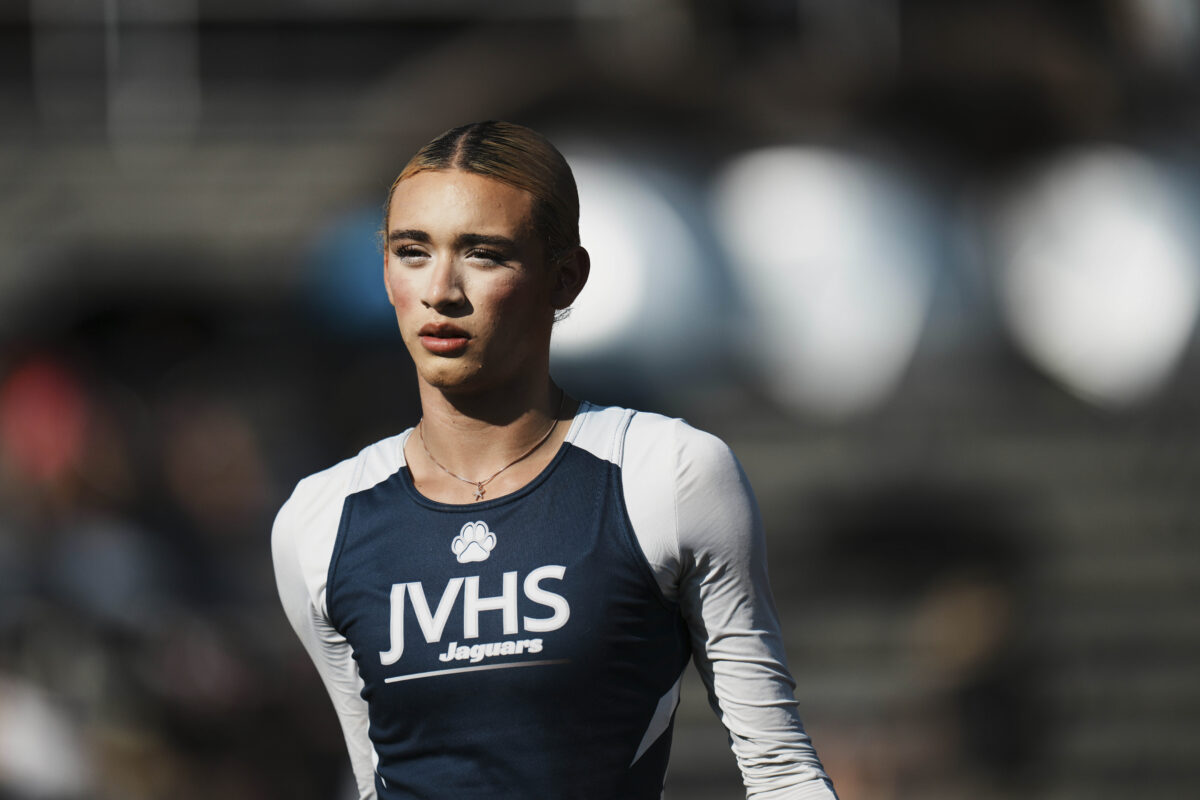 AB Hernandez, a transgender student at Jurupa Valley High School, walks across the field during the California high school track-and-field championships in Clovis, Calif., Friday, May 30, 2025. (AP Photo