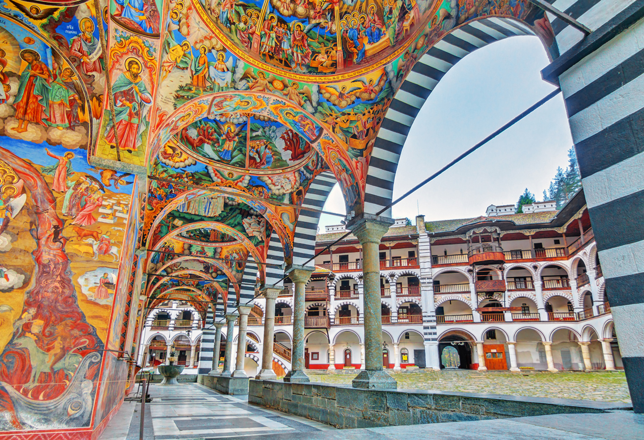 Beautiful view of the vibrant decoration of the Orthodox Rila Monastery, a famous tourist attraction and cultural heritage monument in the Rila Nature Park mountains in Bulgaria