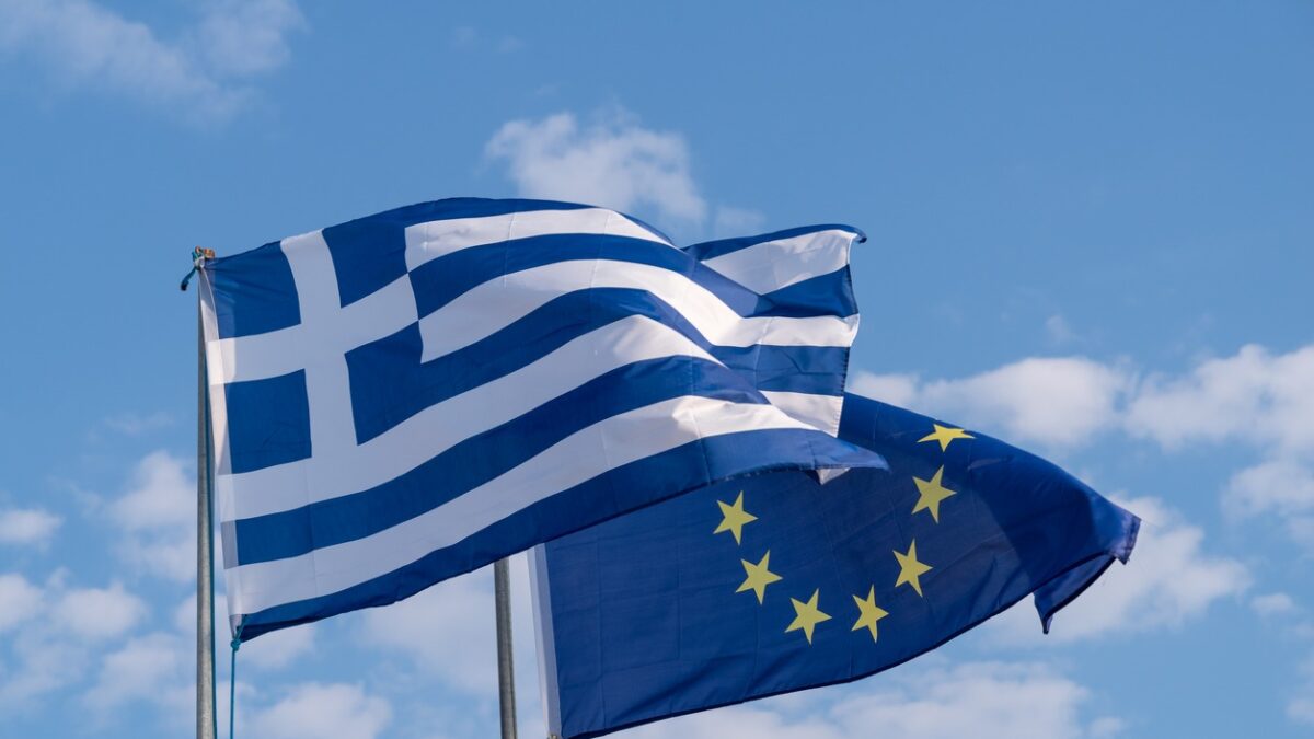 The national flag of Greece and the flag of the European Union