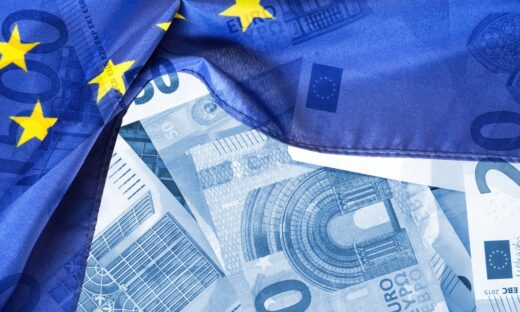 Flag of the European Union EU and euro banknotes