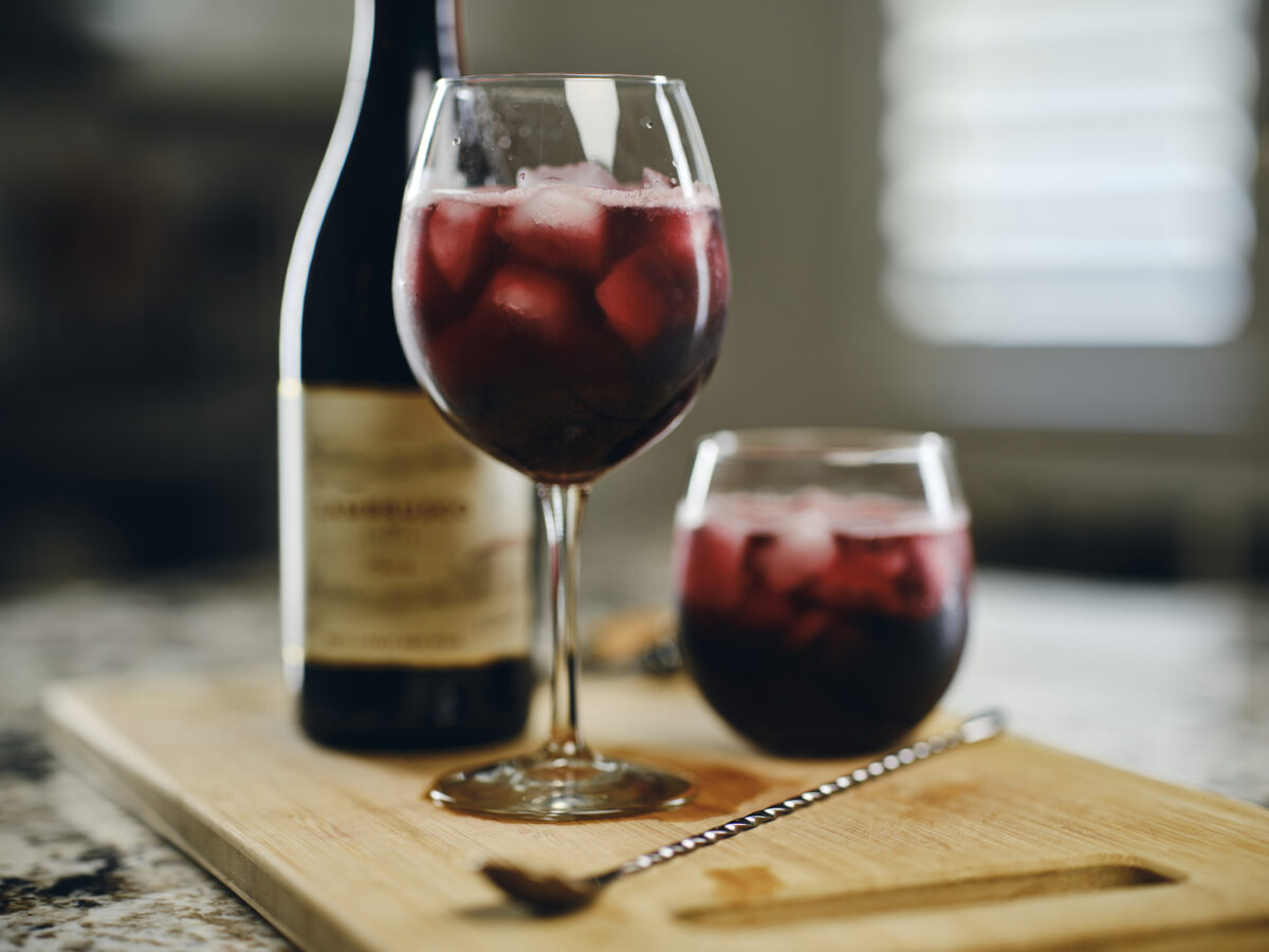 A closeup of a glass of a chilled wine that is served over ice
