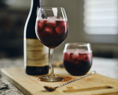 A closeup of a glass of a chilled wine that is served over ice