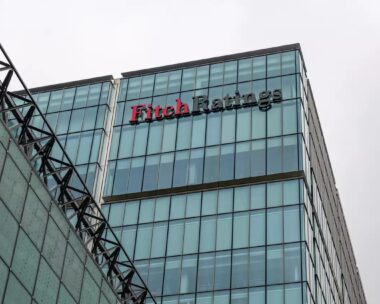 London. UK-03.30.2022. The offices and signage of the American rating agency Fitch Ratings in Canary Wharf.