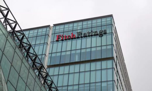 London. UK-03.30.2022. The offices and signage of the American rating agency Fitch Ratings in Canary Wharf.