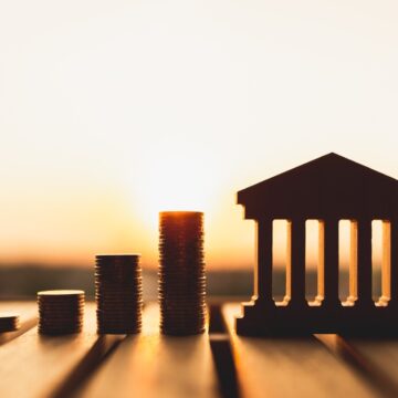 Bank symbol with with coins stack