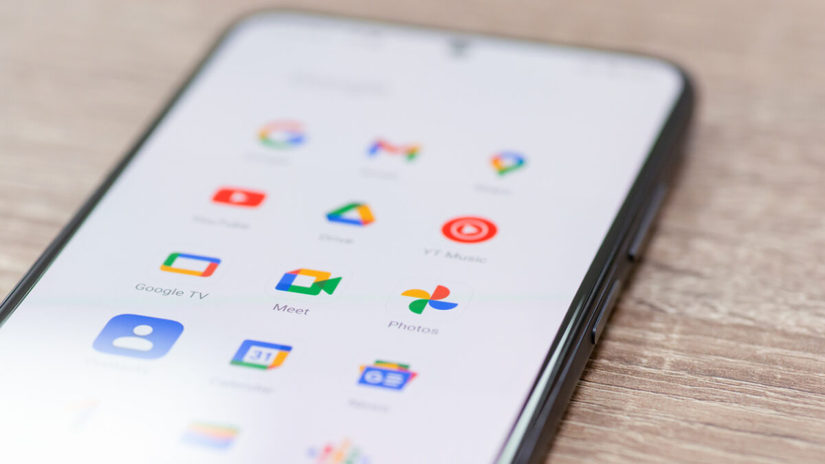 Chernihiv, Ukraine - December 22, 2022: Screen of smartphone with icons of Google apps grouped together. Close up shot of icons on mobile phone, global information sharing
