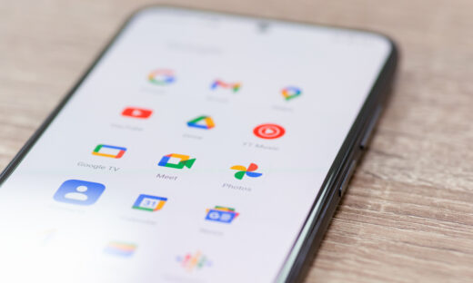 Chernihiv, Ukraine - December 22, 2022: Screen of smartphone with icons of Google apps grouped together. Close up shot of icons on mobile phone, global information sharing
