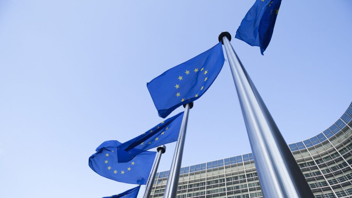 European Union flags in front of the Berlaymont building in Brussels, Belgium