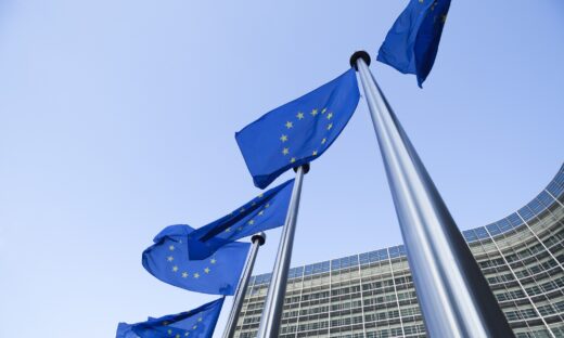 European Union flags in front of the Berlaymont building in Brussels, Belgium