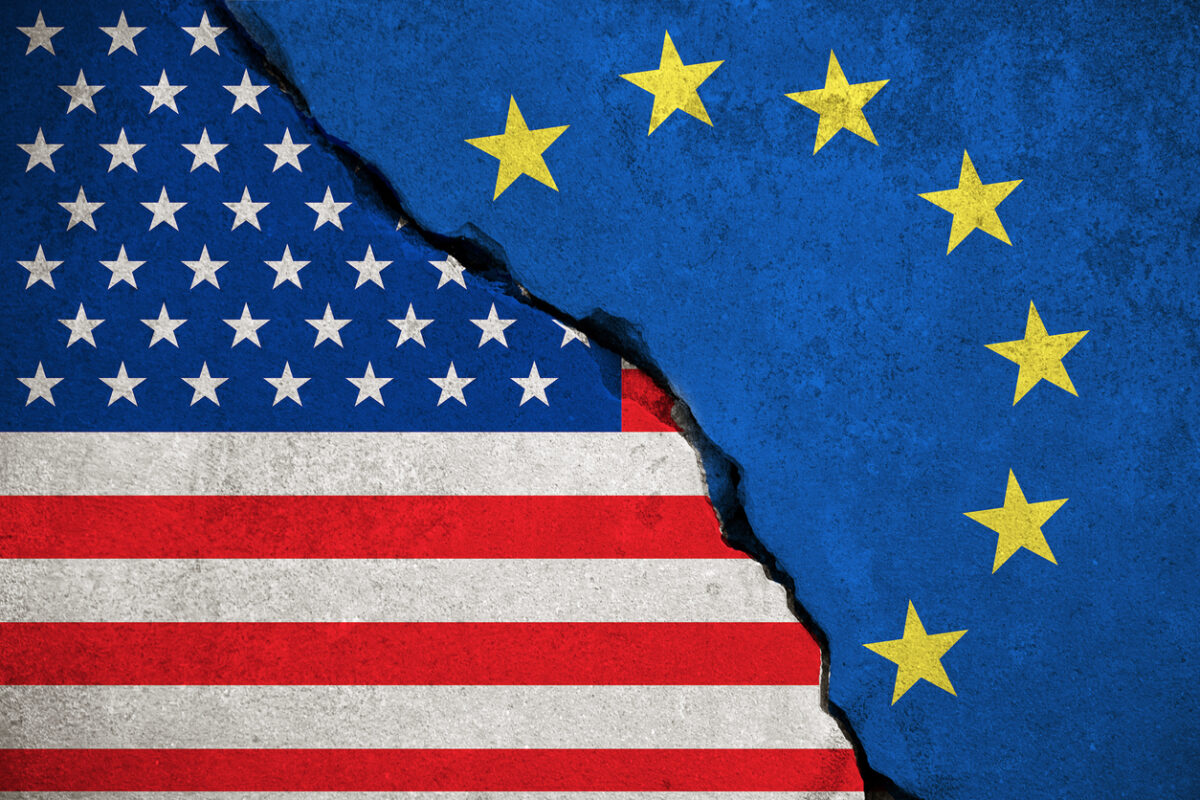blue european union EU flag on broken wall and half usa united states of america flag, crisis trump president and europe euro concept