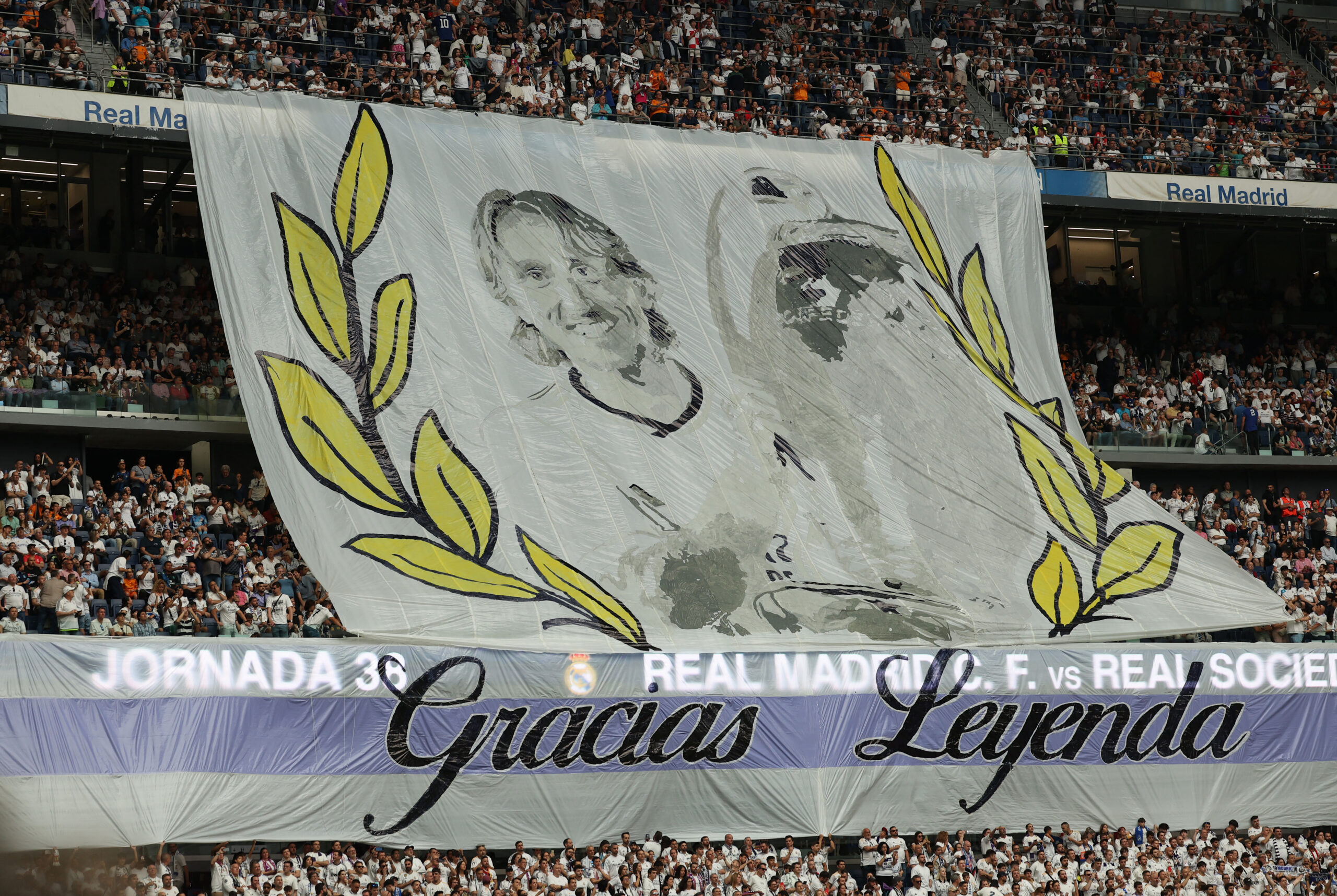 Soccer Football - LaLiga - Real Madrid v Real Sociedad - Santiago Bernabeu, Madrid, Spain - May 24, 2025 A banner is displayed by fans for Real Madrid's Luka Modric ahead of his last LaLiga match for Real Madrid REUTERS